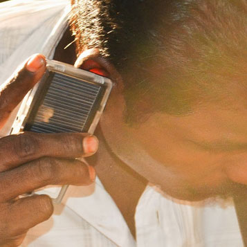 Man listening to his MegaVoice audio book
